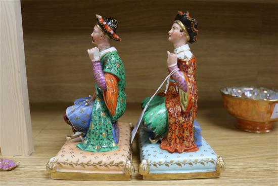 A pair of Paris area figures of a Chinaman and Chinawoman, with detachable heads